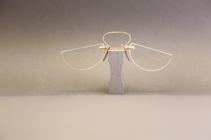 pince-nez percée C-pont demi-lune